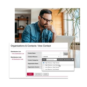 man looking at computer on the background and tractivity system screenshot